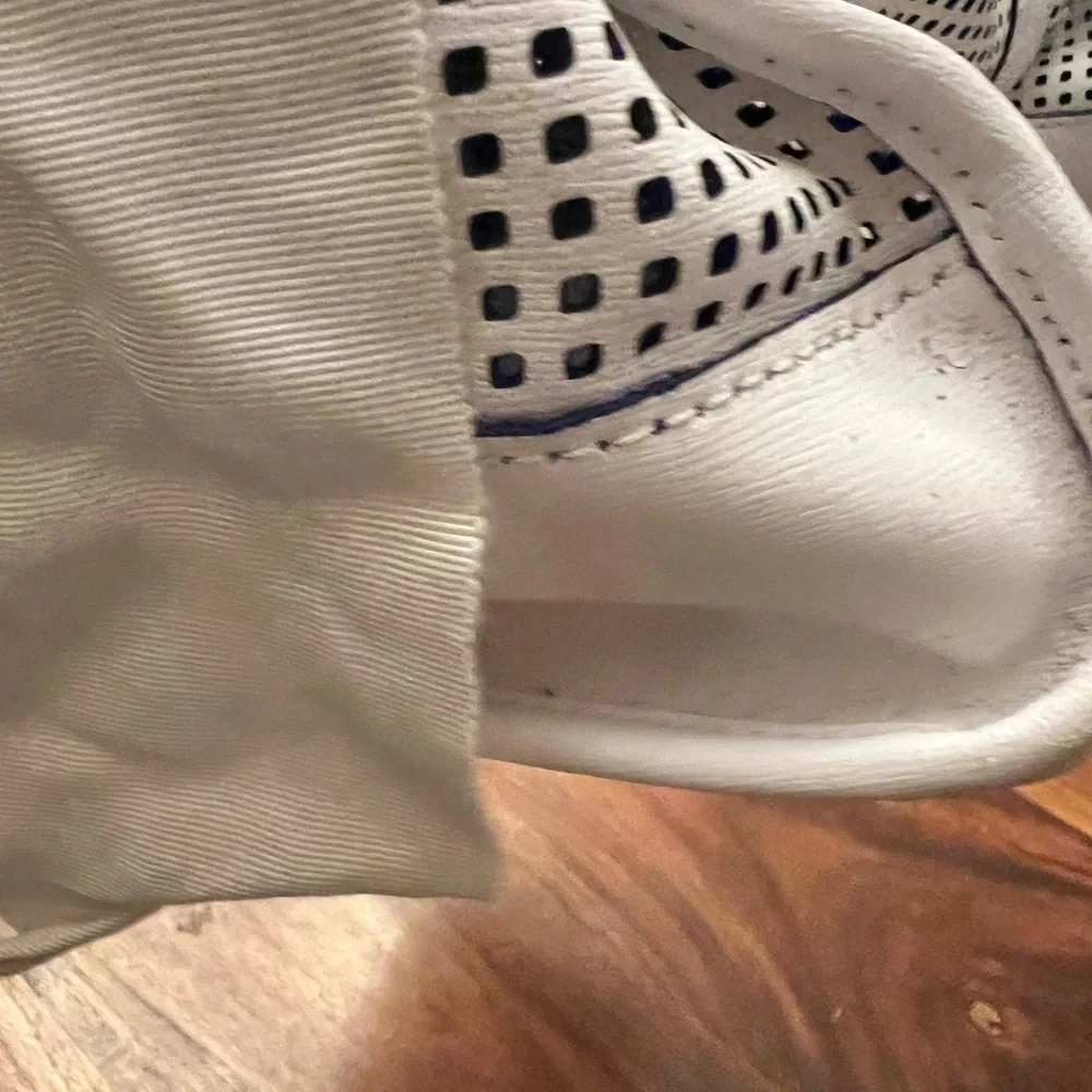 Juicy Couture White and Black Perforated Satchel